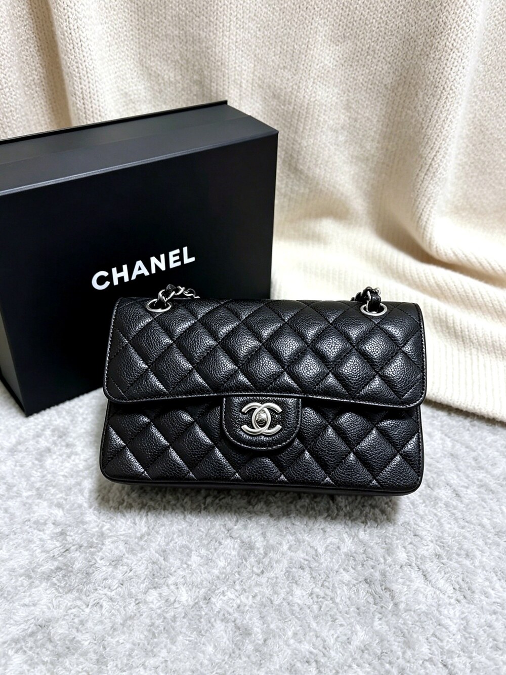 CHANEL Classic Flap Bag in Black Caviar Leather